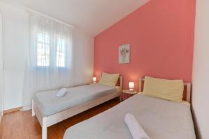Posteľ alebo postele v izbe v ubytovaní Villa Grande Vista - Spacious 3 BR Apartment with Large terrace and Fantastic sea view