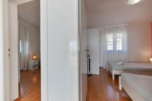 Posteľ alebo postele v izbe v ubytovaní Villa Grande Vista - Spacious 3 BR Apartment with Large terrace and Fantastic sea view