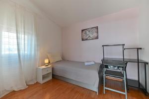 Posteľ alebo postele v izbe v ubytovaní Villa Grande Vista - Spacious 3 BR Apartment with Large terrace and Fantastic sea view