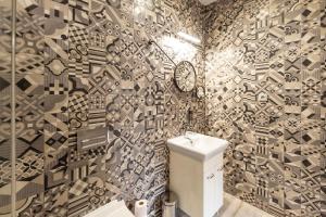 Uma casa de banho em Apartmány Holiday