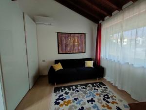 Suite with Lake Como view tesisinde bir odada yatak veya yataklar