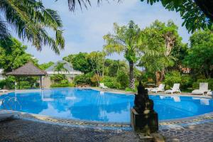 a pool at the resort at Panorama cottages 1 #31 in Legian