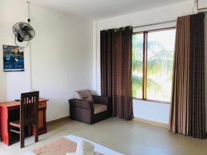 Posezení v ubytování Rivonway Hotel Polonnaruwa