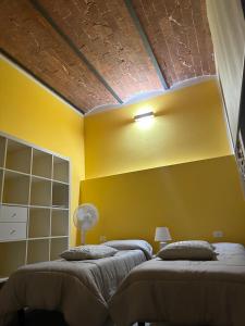 Posteľ alebo postele v izbe v ubytovaní Casa antica Maremma Toscana