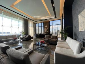 Area soggiorno di Hotel A and A Quezon City powered by Cocotel
