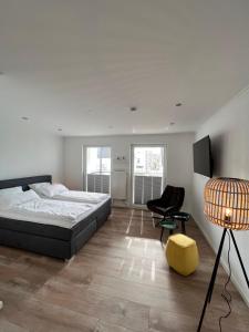 Postel nebo postele na pokoji v ubytování Hotel Paula Norderney