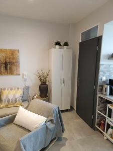 A kitchen or kitchenette at Polys Apartment and Paraskevi studio with view