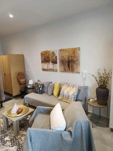 A seating area at Polys Apartment and Paraskevi studio with view