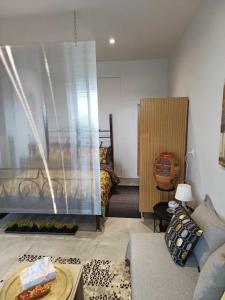 A seating area at Polys Apartment and Paraskevi studio with view
