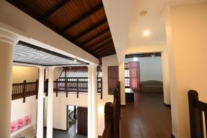 Postel nebo postele na pokoji v ubytování Serene Manor