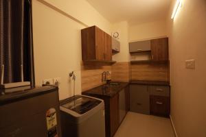 Kuchyň nebo kuchyňský kout v ubytování VVP SERVICE apartment