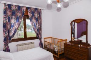 A bed or beds in a room at Casa los Arcos