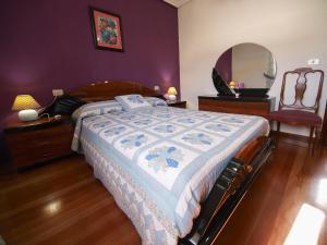 A bed or beds in a room at Casa los Arcos