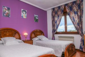 A bed or beds in a room at Casa los Arcos