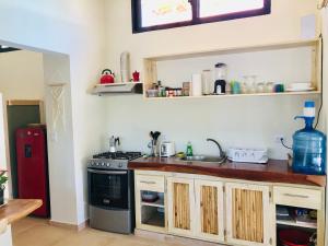 Kuchyň nebo kuchyňský kout v ubytování Sfeervolle studio in Encuentro Cabarete