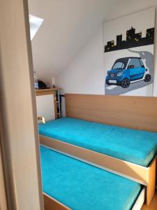 Postel nebo postele na pokoji v ubytování APARTMANI Emerald Dream