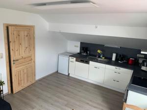 Η κουζίνα ή μικρή κουζίνα στο Ferienapartment Allgäu-Idyll (Dietmannsried)