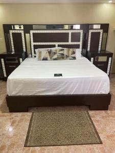 Кровать или кровати в номере Villa vacacional de 5 hab Family