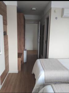 Кровать или кровати в номере QUARTO DUPLO - Suíte