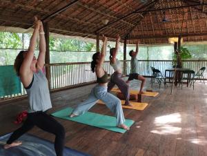 a group of people in a yoga class at Ruban Yoga in Palolem +39 photos