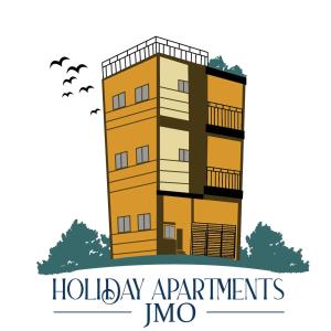 an apartment building with the words holiday apartments imo at JMO Apartments in Antipolo