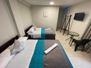 Voodi või voodid majutusasutuse Vianca Hotel toas