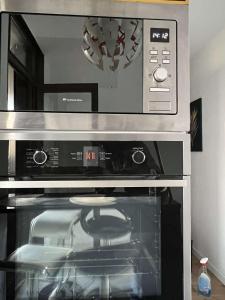Kuchnia lub aneks kuchenny w obiekcie Appartement moderne vieille ville PARKING GRATUIT