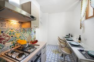 Kuhinja oz. manjša kuhinja v nastanitvi AMORE RENTALS - Casa Barbera A