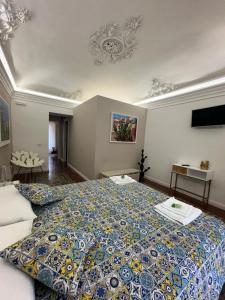 Posteľ alebo postele v izbe v ubytovaní Sikelia-sicilian rooms