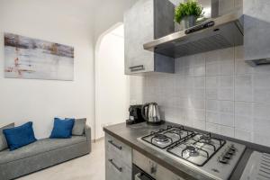 Η κουζίνα ή μικρή κουζίνα στο White Flat San Lorenzo +8 φωτογραφίες