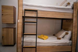 a couple of bunk beds in a room at Soul Surf House in Agadir