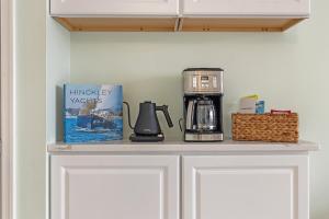 a kitchen counter with a coffee maker on it at Cabana Palms - Oceanfront Renovated King Bed Sauna in Myrtle Beach
