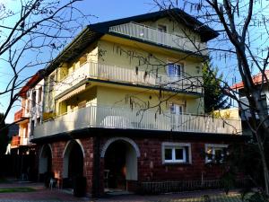 a building with graffiti on the side of it at Villa Romano in Kielce