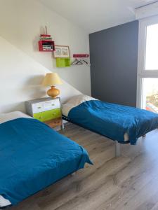 Posteľ alebo postele v izbe v ubytovaní Grande Maison Familiale à Nantes avec Piscine + 17 fotografií