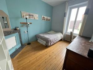 Posteľ alebo postele v izbe v ubytovaní Grande Maison Familiale à Nantes avec Piscine