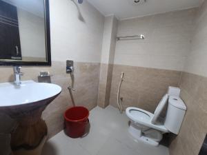 Ванная комната в Hotel S.A International +20 фотографий