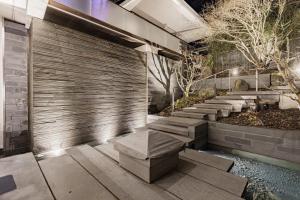 a set of steps leading up to a building at S-Villa plus Water Feature & Zen Garden in Vancouver