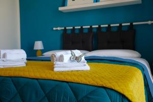 A bed or beds in a room at Biddizzi