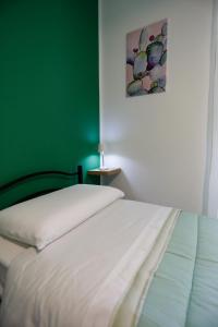 A bed or beds in a room at Biddizzi