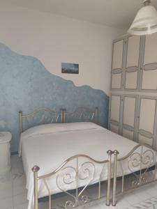 Postel nebo postele na pokoji v ubytování B&B Il Cedro
