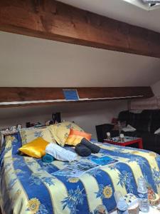 Postel nebo postele na pokoji v ubytování ICI et MAINTENANT