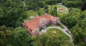 an aerial view of a large house with a garden at Apartament maciejoki in Wejherowo