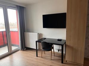Μια τηλεόραση ή/και κέντρο ψυχαγωγίας στο Apartamenty Platinex 1 +3 φωτογραφίες