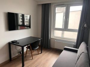 Μια τηλεόραση ή/και κέντρο ψυχαγωγίας στο Apartamenty Platinex 1