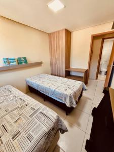 pokój hotelowy z dwoma łóżkami w pokoju w obiekcie Ecolife Térreo frente piscinas w mieście Porto de Galinhas +21 zdjęć