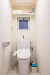 Ett badrum på PREMIER suite Shinjuku takadanobaba