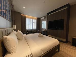 TV o dispositivi per l'intrattenimento presso Hotel A and A Quezon City powered by Cocotel