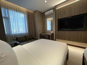 TV o dispositivi per l'intrattenimento presso Hotel A and A Quezon City powered by Cocotel