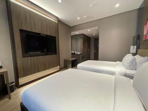 TV o dispositivi per l'intrattenimento presso Hotel A and A Quezon City powered by Cocotel