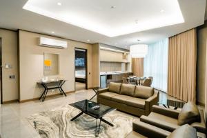 Area soggiorno di Hotel A and A Quezon City powered by Cocotel